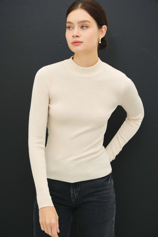 The Cremé Sweater